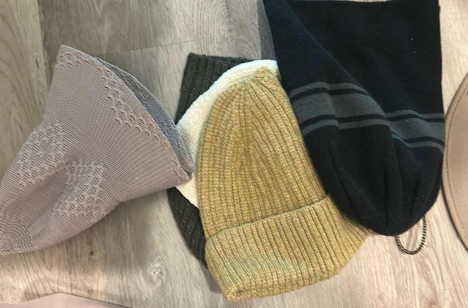 Photo 1 of CONTENTS OF PLASTIC BIN ASSORTED HATS GLOVES BEANIES