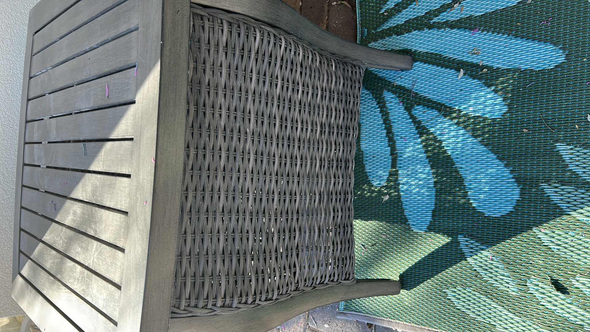 Photo 1 of OUTDOOR TABLE W SLATED TOP AND WOVEN BASE 26" X 24" H 22"