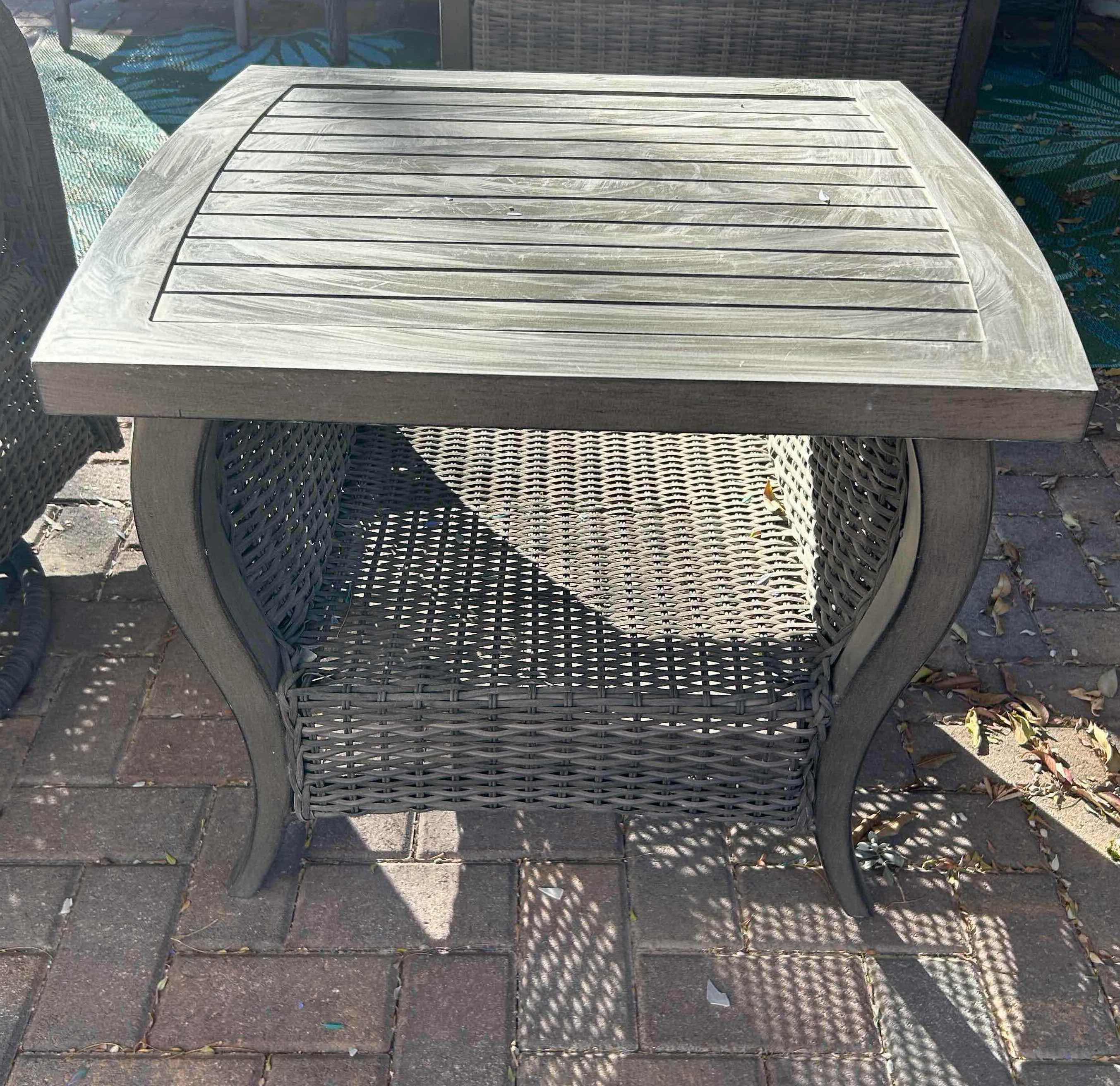 Photo 1 of OUTDOOR TABLE W SLATED TOP AND WOVEN BASE 26" X 24" H 22"