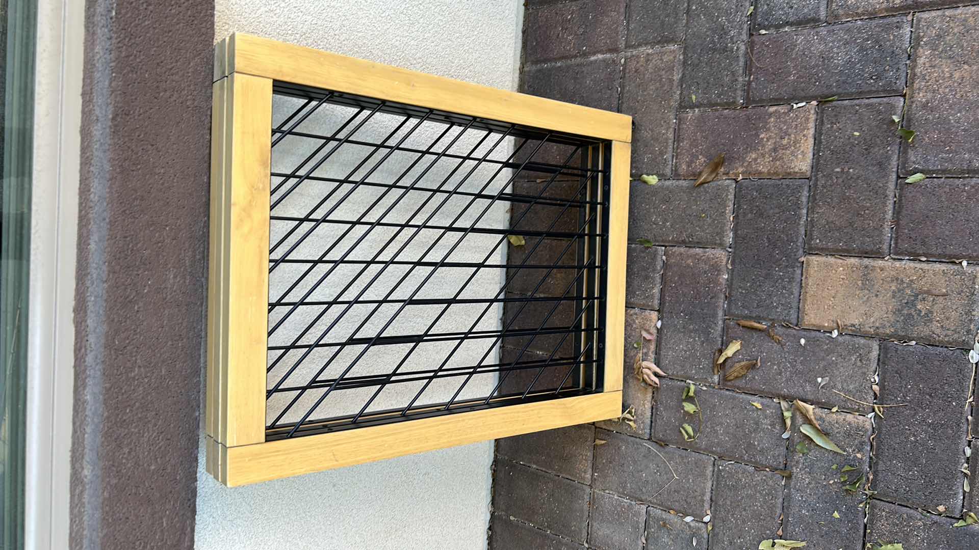 Photo 1 of FREESTANDING 3 PANEL PET GATE IN A NATURAL WOOD FINISH