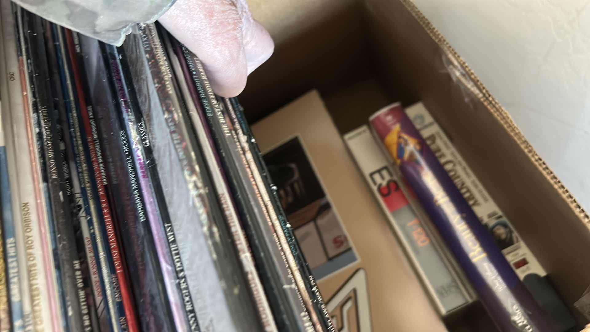 Photo 1 of BOX FULL OF RECORD ALBUMS AND DVD’s