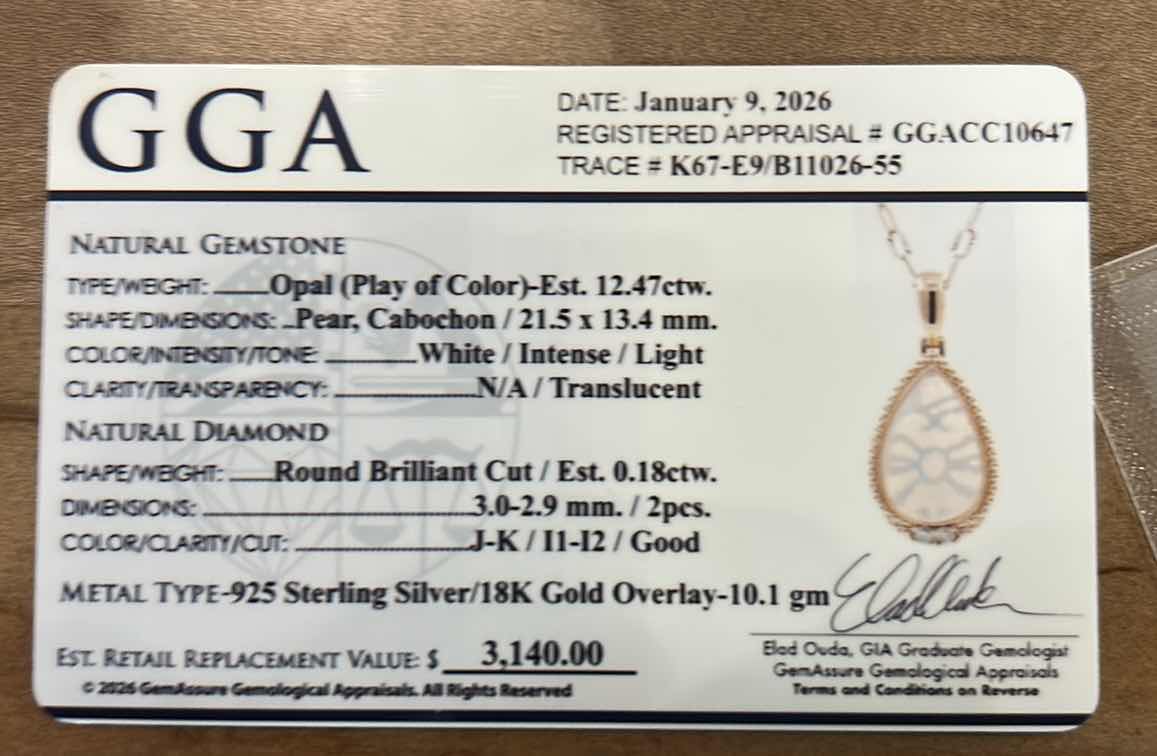 Photo 1 of STERLING SILVER W 18K GOLD OVERLAY W NATURAL OPAL (PLAY OF COLOR) APPROX 12.47 CTW PEAR CABOCHON PENDANT AND NATURAL DIAMOND 0.18 CTW GGA CERTIFIED -NK017295