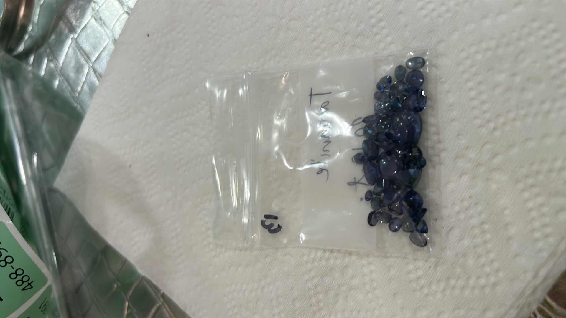 View 4 of PARCEL OF NATURAL TANZANITE ZOISITE (COBALT COLOR COATED) MULTI-MIXED CUTS APPROX 20.18 CTW GGA CERTIFIED
