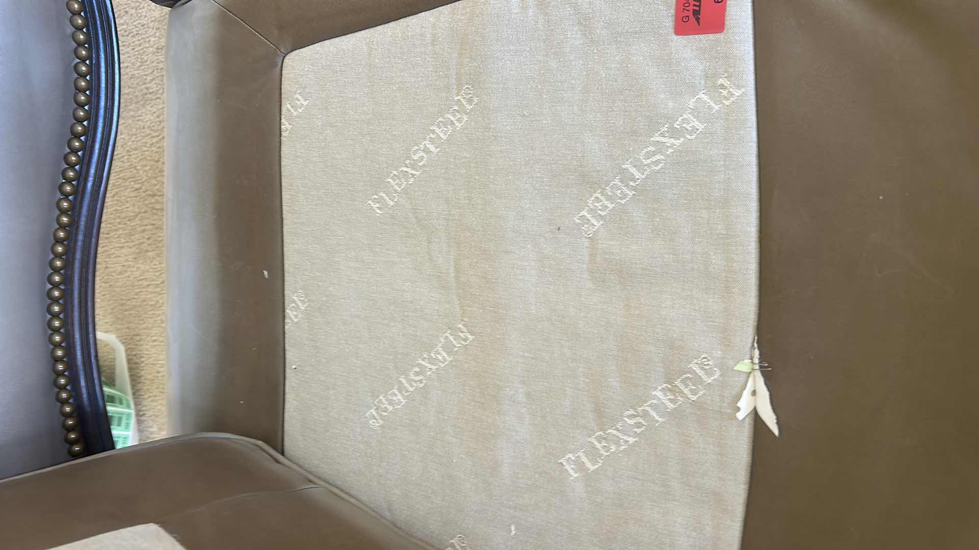 Photo 1 of LOUIS XV-STYLE BERGÈRE CHAIR WITH DARK WOOD FRAME AND LIGHT-COLORED LEATHER OR SUEDE UPHOLSTERY. 31“ x 29“ x H35“