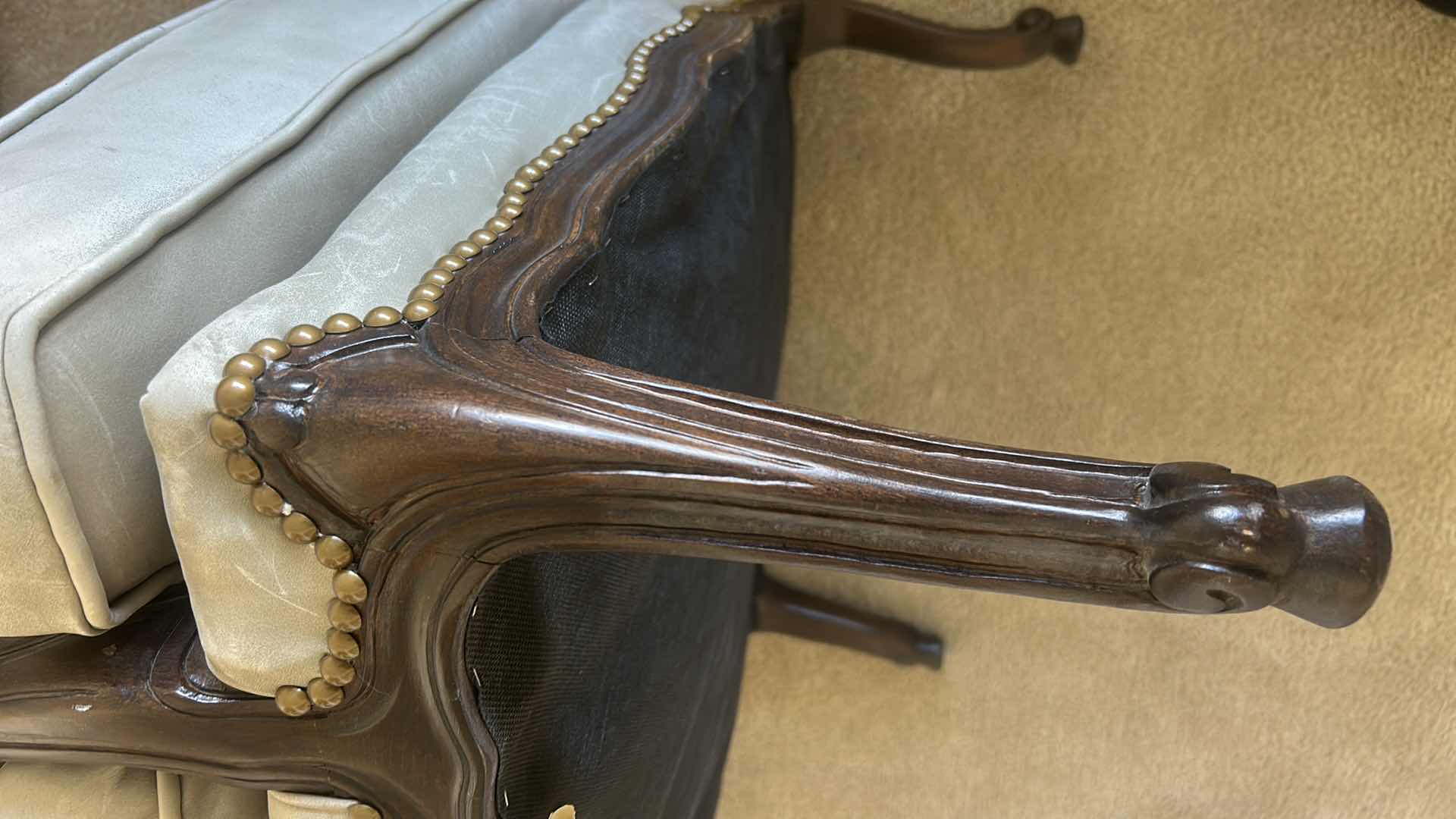 Photo 1 of LOUIS XV-STYLE BERGÈRE CHAIR WITH DARK WOOD FRAME AND LIGHT-COLORED LEATHER OR SUEDE UPHOLSTERY. 31“ x 29“ x H35“