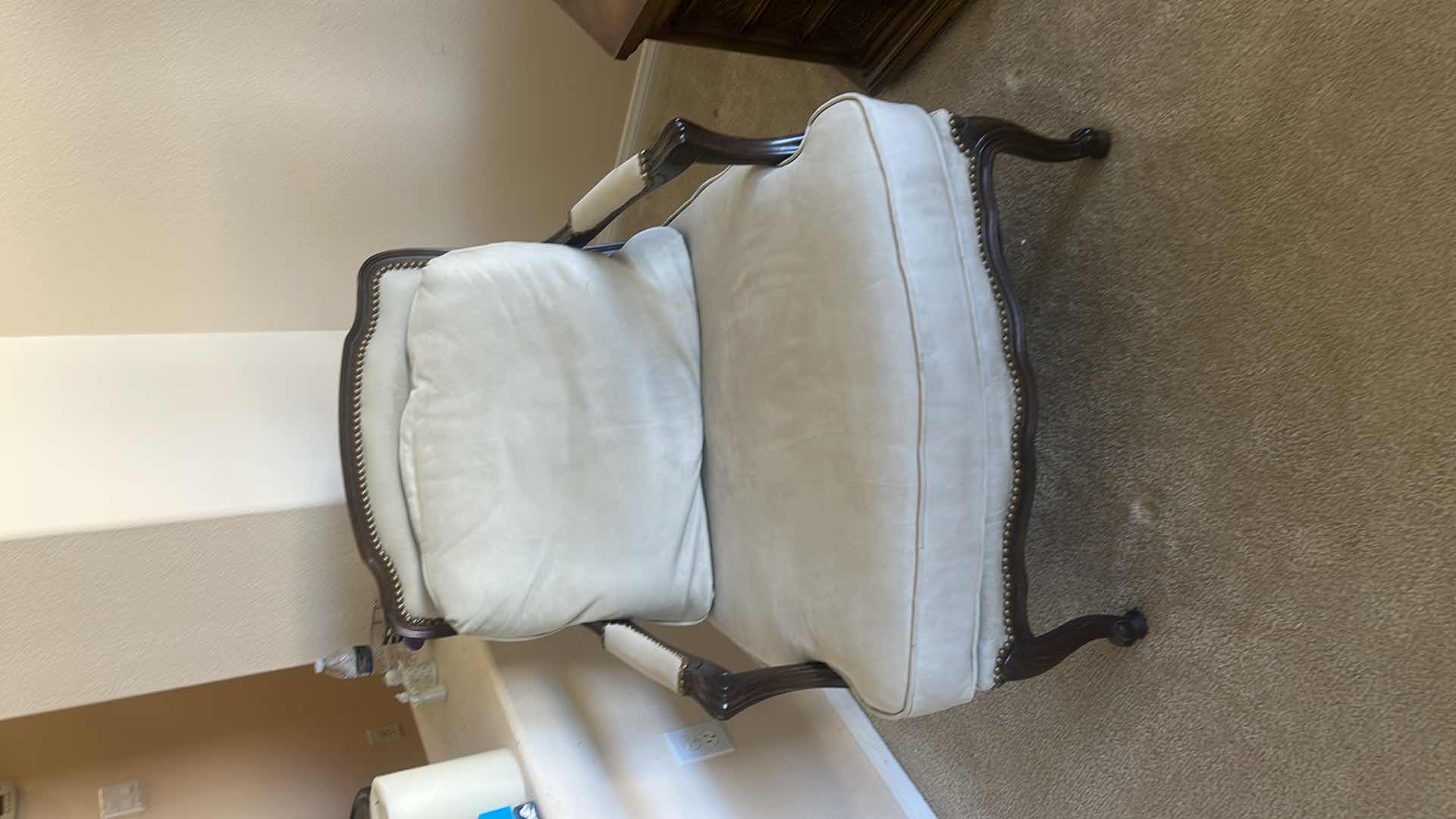 Photo 1 of LOUIS XV-STYLE BERGÈRE CHAIR WITH DARK WOOD FRAME AND LIGHT-COLORED LEATHER OR SUEDE UPHOLSTERY. 31“ x 29“ x H35“