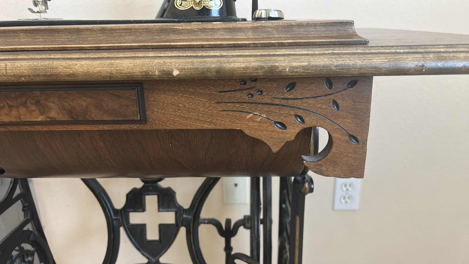 Photo 1 of ANTIQUE HELVETIA TREADLE SEWING MACHINE AND CABINET, ORNATE CAST IRON AND GOLD DETAILING PLUS PARTS. INCLUDES CAST IRON TREADLE BASE, SEWING MACHINE HEAD, WOOD TABLE TOP, DRAWERS, AND LOOSE WOOD COMPONENTS.
36 1/2“ x 18 1/2“ x H32“