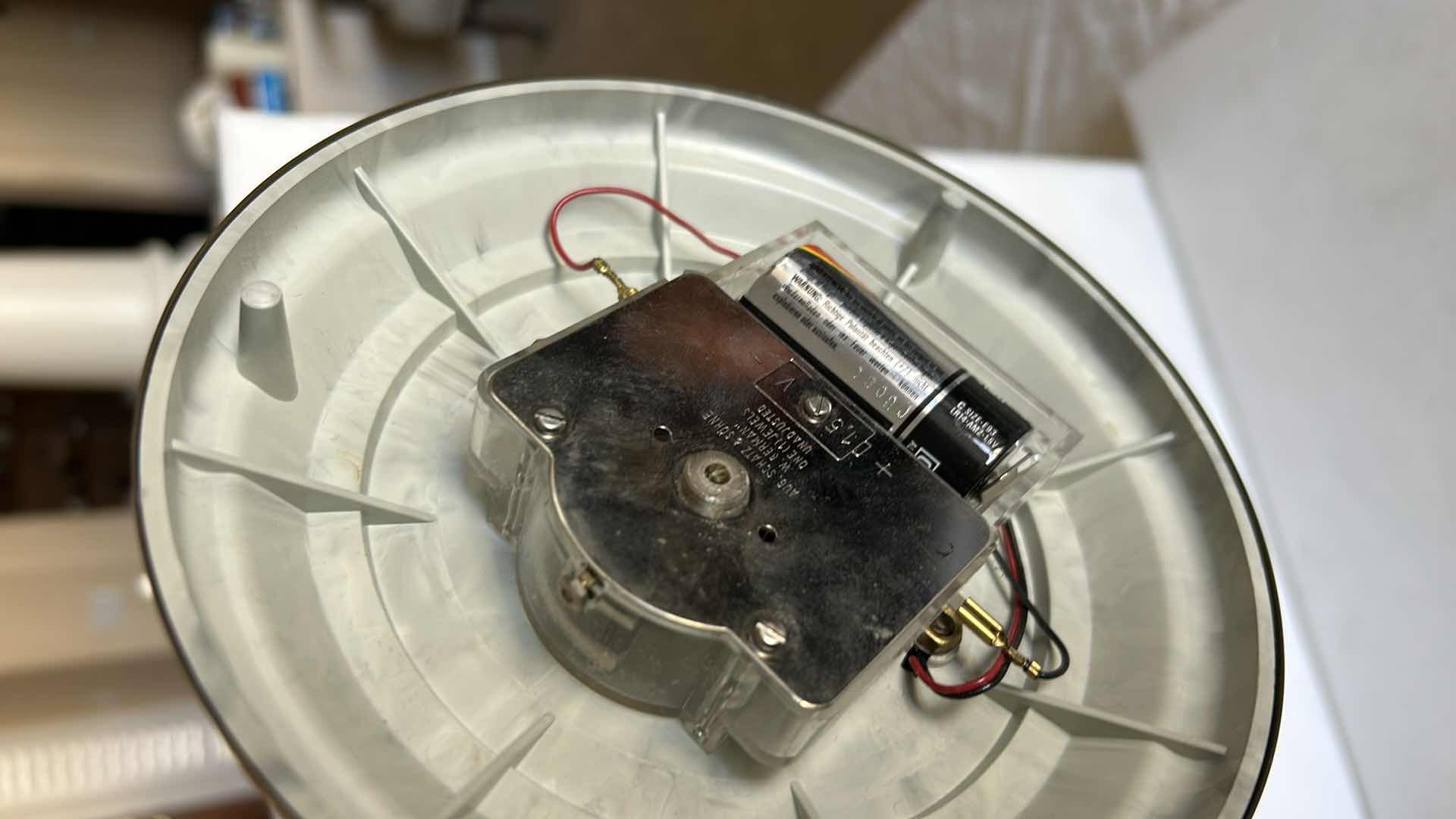 Photo 1 of SCHATZ QUARTZ ANNIVERSARY CLOCK WITH GLASS DOME. BRASS-TONE FRAME WITH ROTATING PENDULUM BALLS AND ROUND CLOCK FACE H 9 1/2”