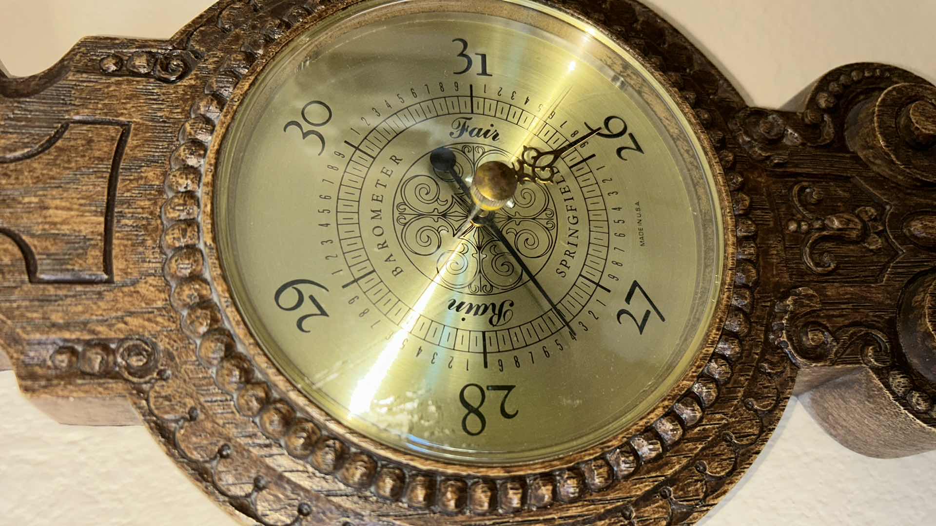 Photo 1 of ANTIQUE STYLE WALL-MOUNTED BAROMETER AND THERMOMETER. ORNATE DECORATIVE FRAME WITH ROUND DIAL AND VERTICAL TEMPERATURE GAUGE. RESIN H30’