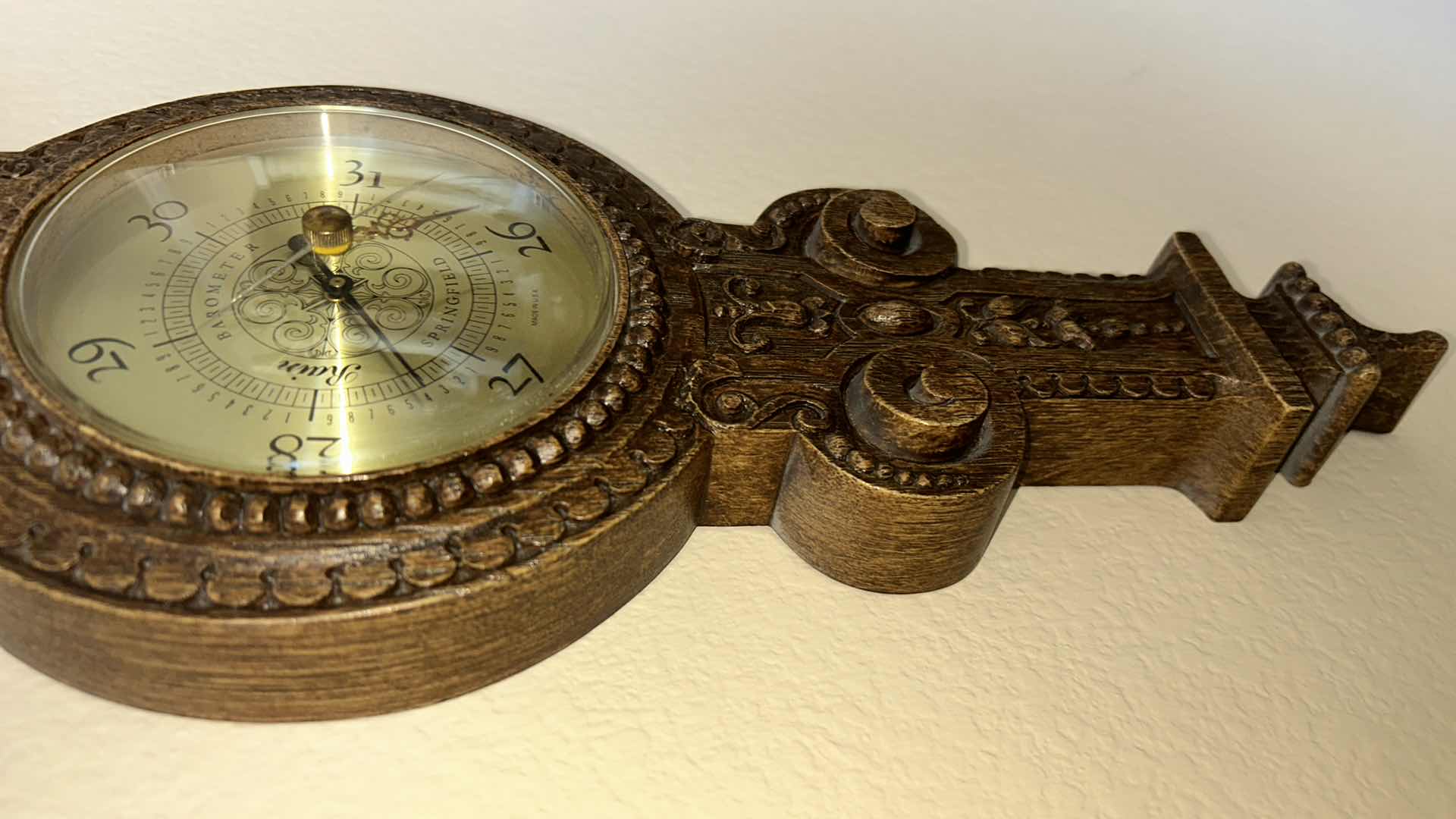 Photo 1 of ANTIQUE STYLE WALL-MOUNTED BAROMETER AND THERMOMETER. ORNATE DECORATIVE FRAME WITH ROUND DIAL AND VERTICAL TEMPERATURE GAUGE. RESIN H30’