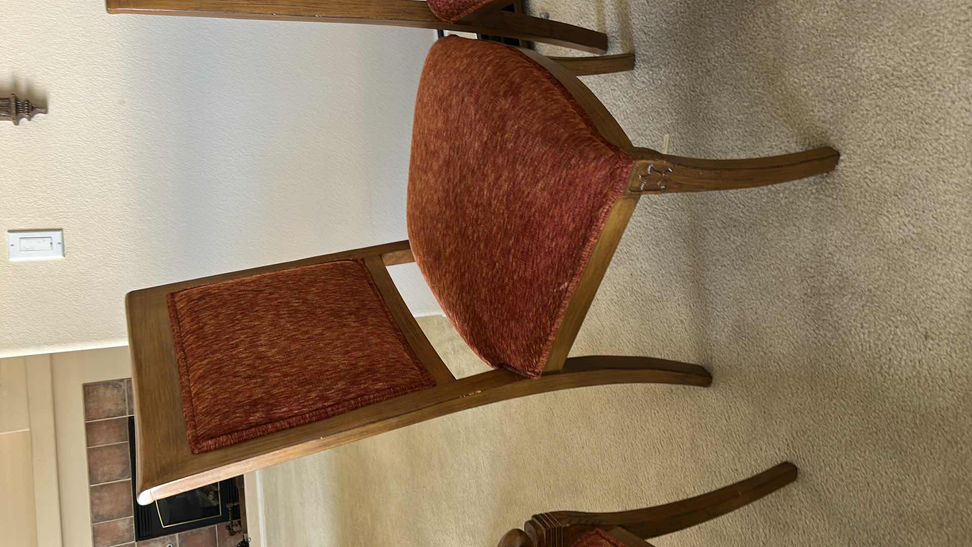 Photo 1 of SET OF TWO WOODEN SIDE CHAIRS WITH UPHOLSTERED SEATS AND BACKS. WOOD FRAMES WITH RED FABRIC CUSHIONS. SUITABLE FOR DINING OR ACCENT SEATING.