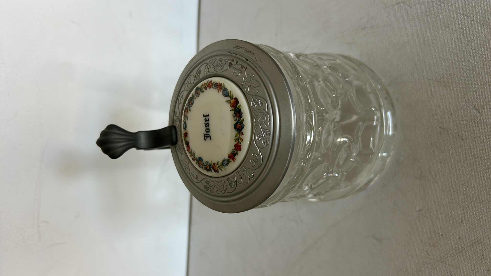 Photo 1 of ORIGINAL BMF SCHNAPSKRUGERL GLASS BEER STEIN. WITH TEXTURED GLASS BODY AND PEWTER LID. FEATURES A THUMB LIFT HANDLE AND DECORATIVE TOP MEDALLION. H6”