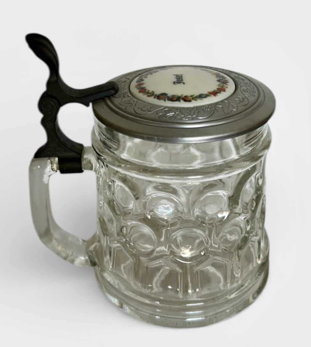 Photo 1 of ORIGINAL BMF SCHNAPSKRUGERL GLASS BEER STEIN. WITH TEXTURED GLASS BODY AND PEWTER LID. FEATURES A THUMB LIFT HANDLE AND DECORATIVE TOP MEDALLION. H6”