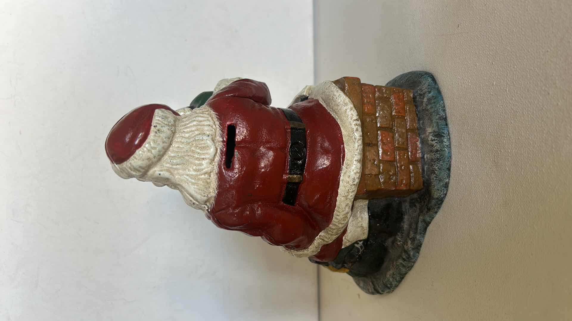 Photo 1 of CAST IRON VINTAGE SANTA CLAUSE HOLDING COCA COLA H8”