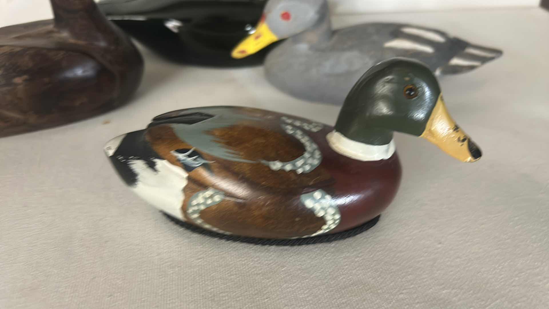 Photo 1 of 4 WOODEN DUCK DECOYS. 7”