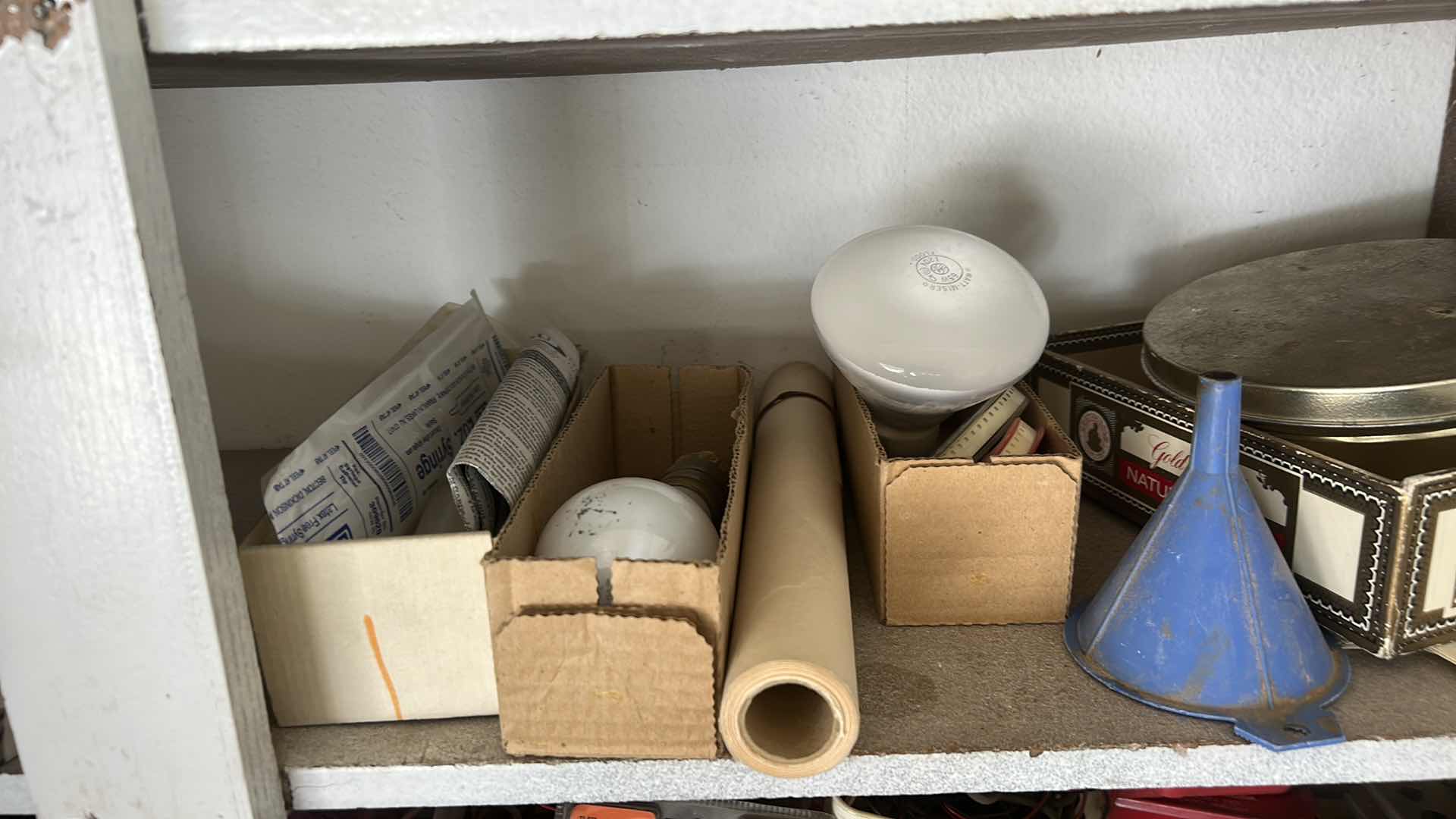 Photo 1 of CONTENTS OF CABINET IN GARAGE