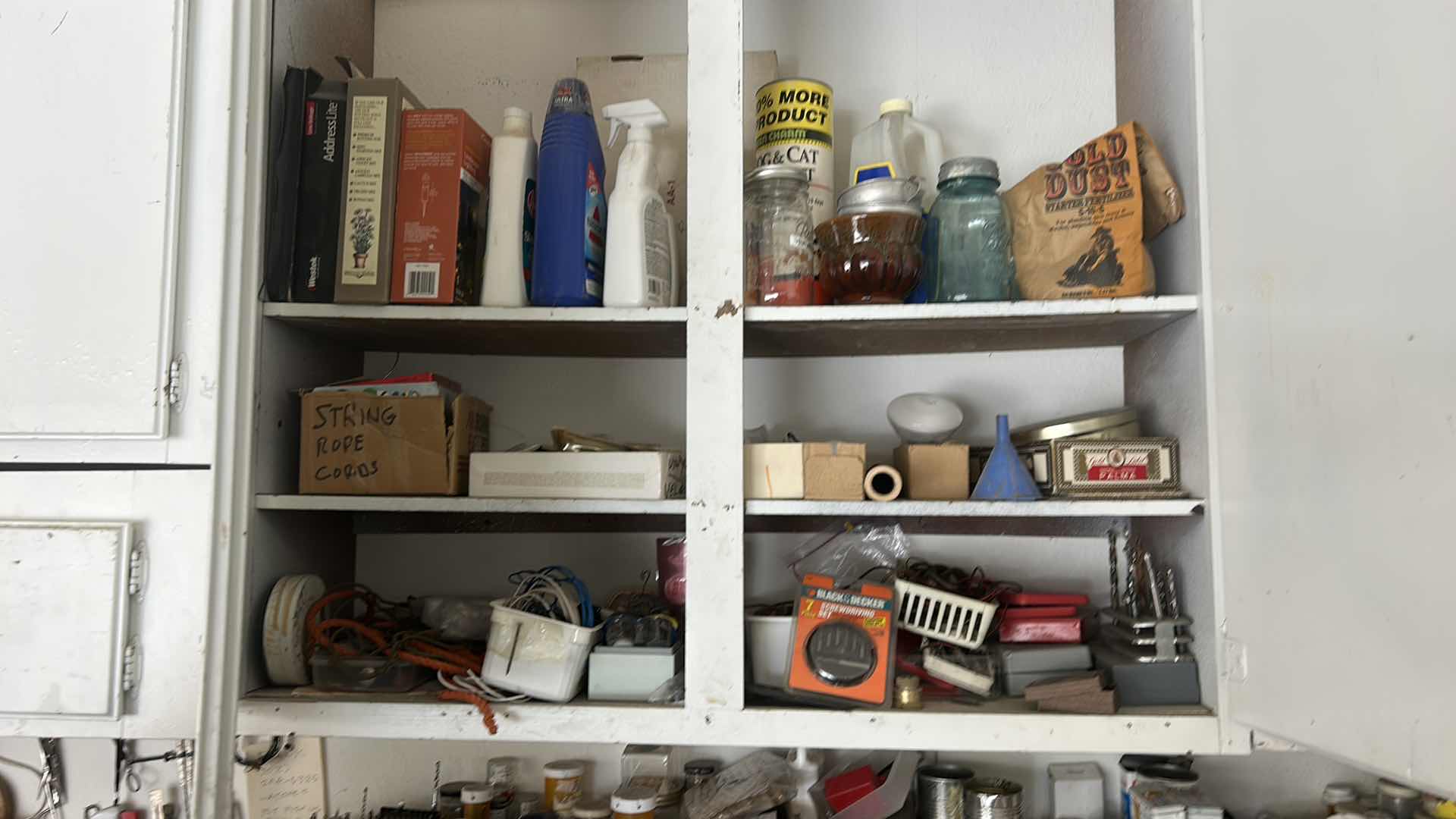 Photo 1 of CONTENTS OF CABINET IN GARAGE