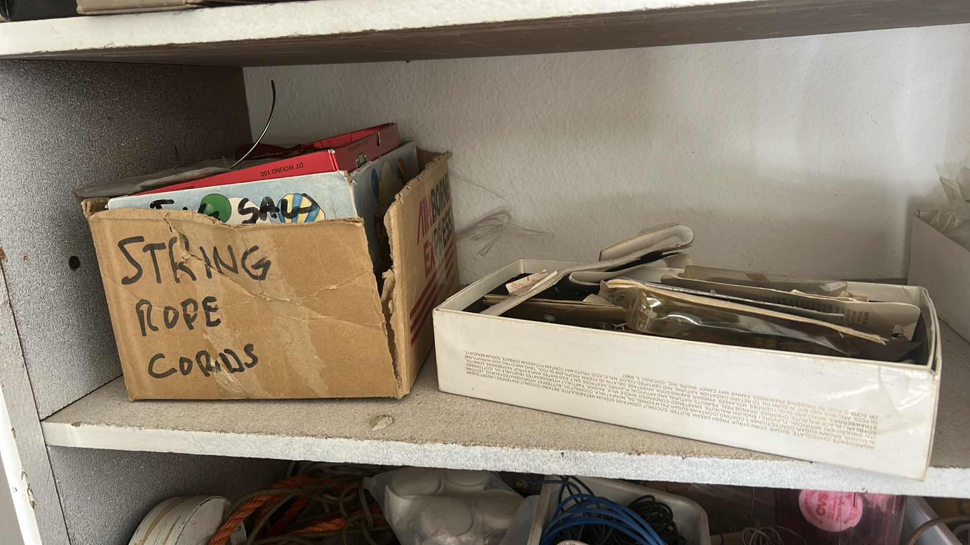 Photo 1 of CONTENTS OF CABINET IN GARAGE