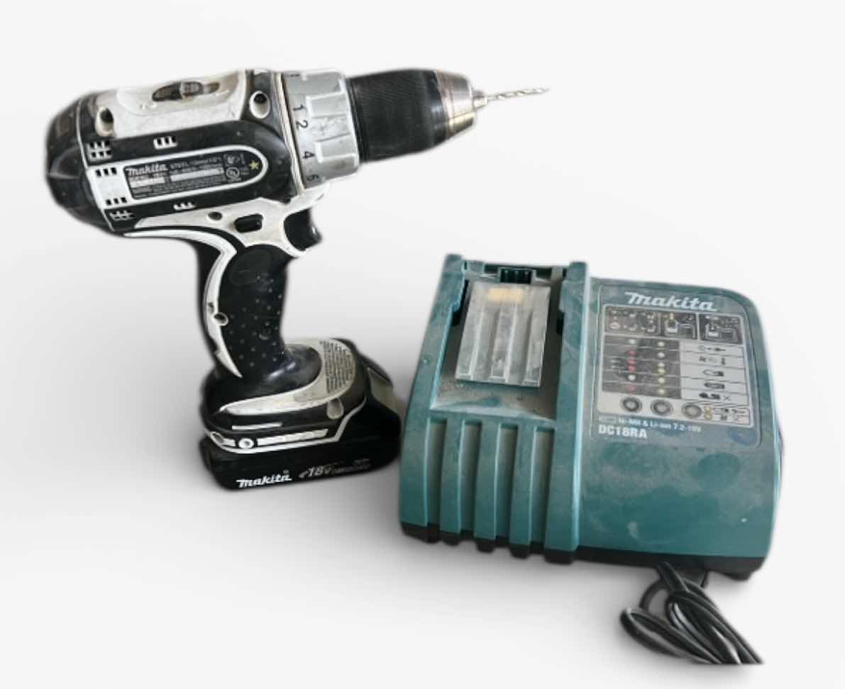 Photo 1 of MAKITA CORDLESS DRILL / DRIVER WITH BATTERY AND MAKITA BATTERY CHARGER.