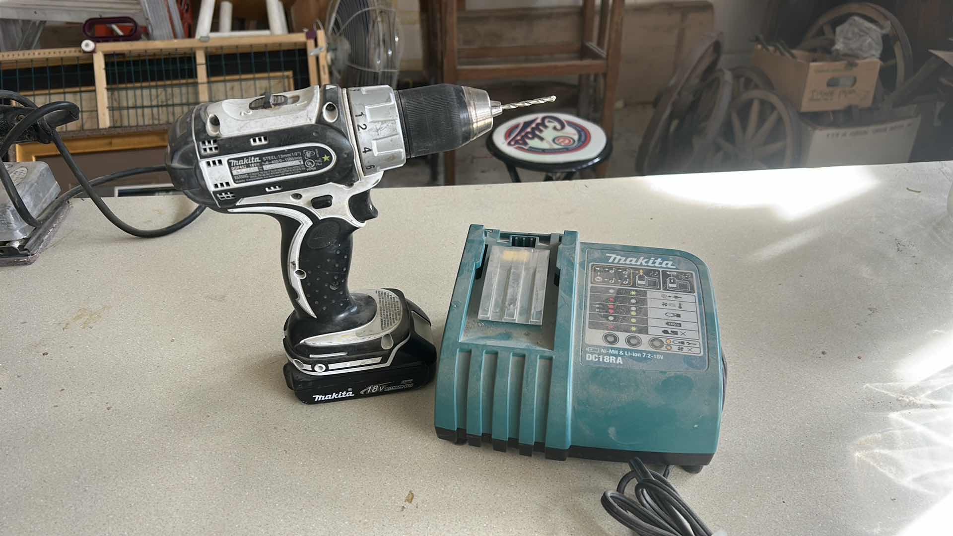 Photo 1 of MAKITA CORDLESS DRILL / DRIVER WITH BATTERY AND MAKITA BATTERY CHARGER.