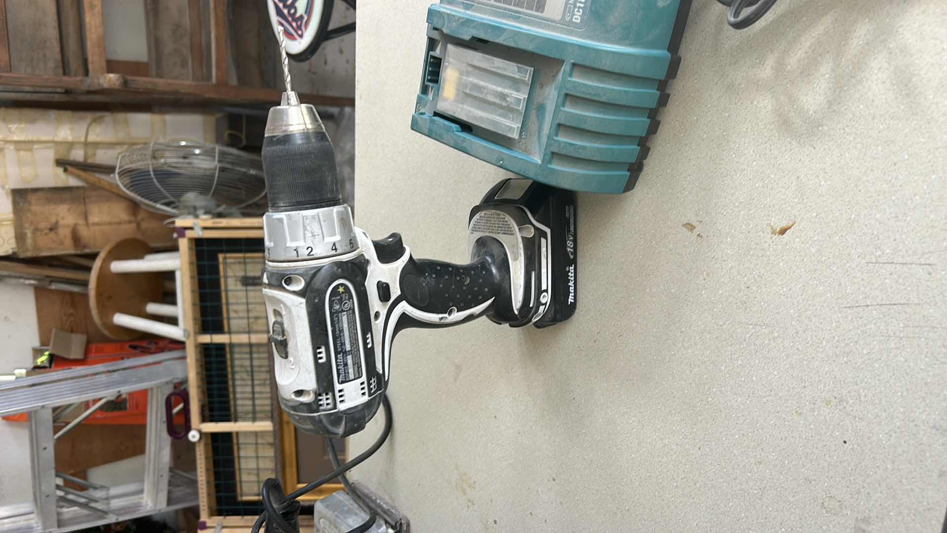 Photo 1 of MAKITA CORDLESS DRILL / DRIVER WITH BATTERY AND MAKITA BATTERY CHARGER.