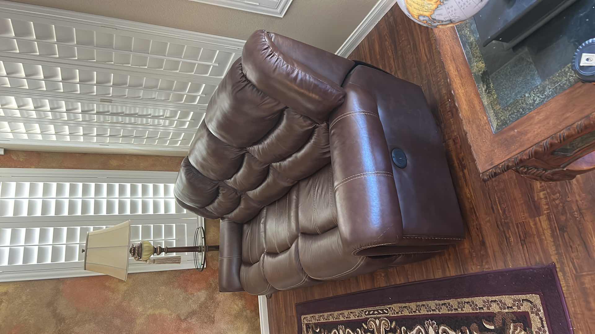 Photo 1 of 7 1/2’ POWER RECLINING LEATHER LOOK SOFA FEATURING CONTRASTING STITCHING, POWER RECLINE FUNCTIONALITY ON THE END SEATS,