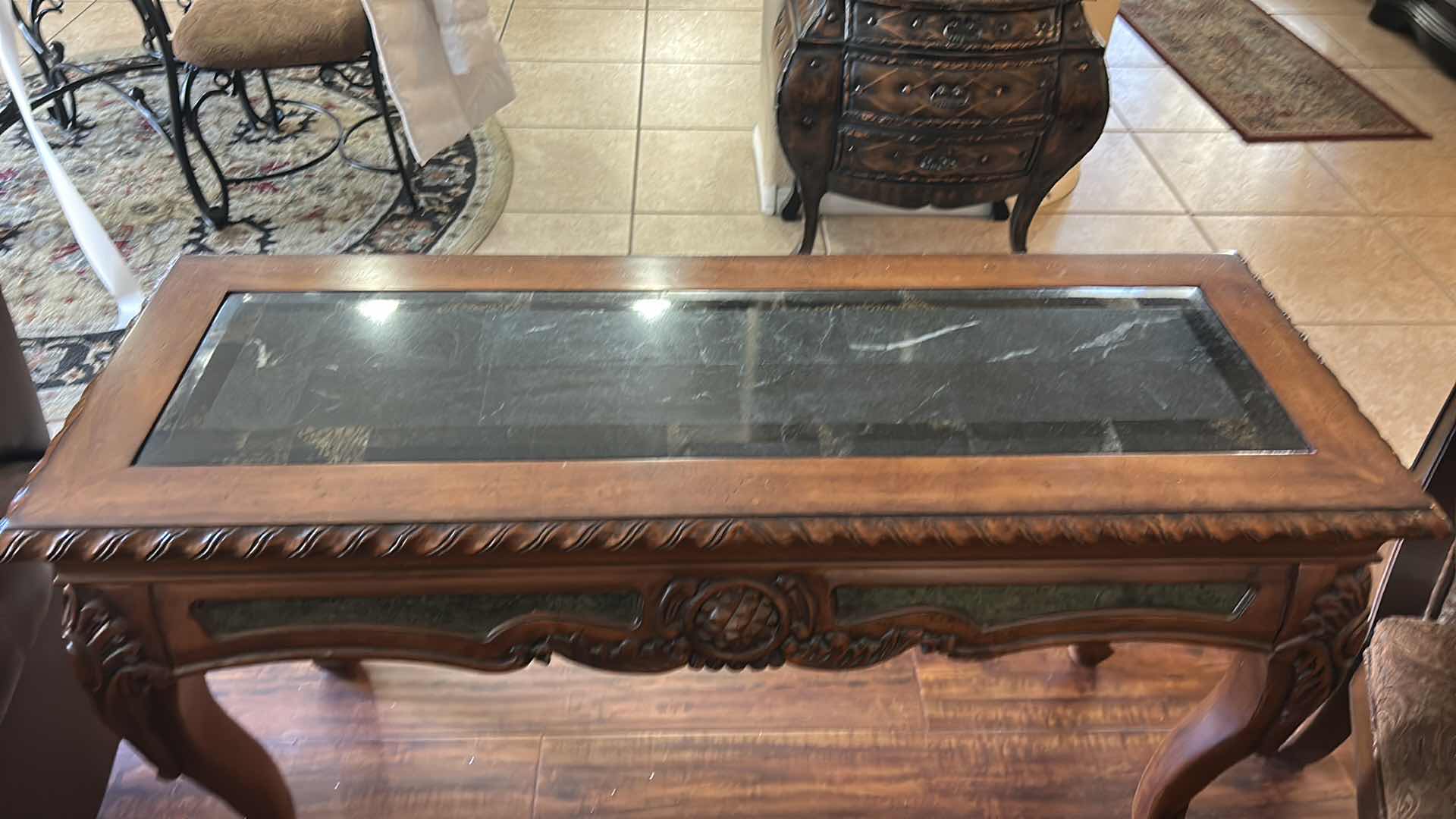 Photo 1 of VINTAGE SOFA TABLE FEATURING A CARVED WOODEN FRAME WITH CABRIOLE LEGS AND A MARBLE TOP.
51“ x 19“ x H30“