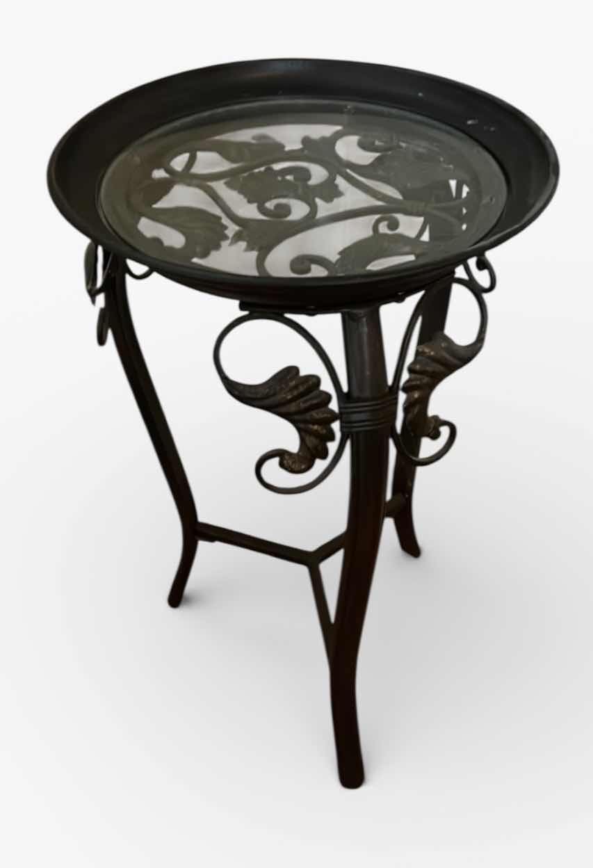 Photo 1 of ROUND METAL ACCENT TABLE WITH GLASS TOP, SCROLLWORK BASE, THREE LEG FRAME 14 1/2” x H2’
