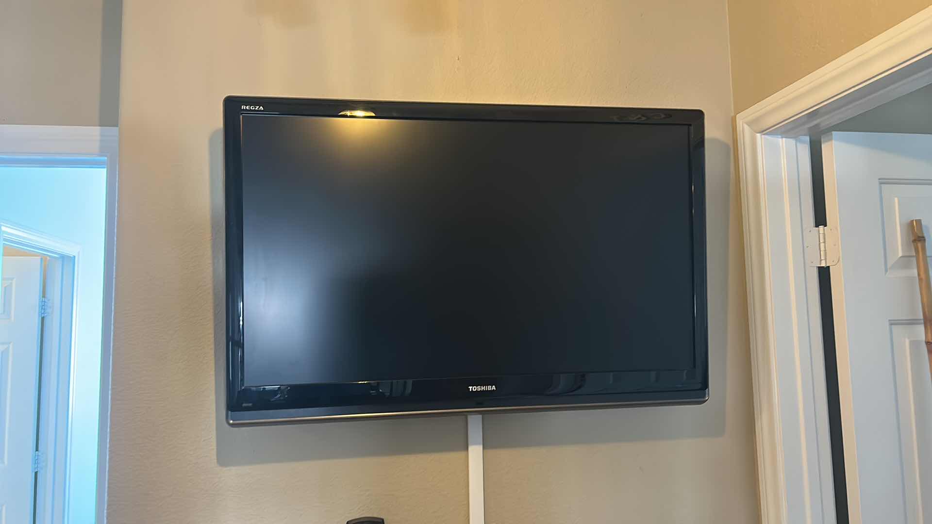 Photo 1 of 42” TOSHIBA WALL MOUNT TV WITH REMOTE