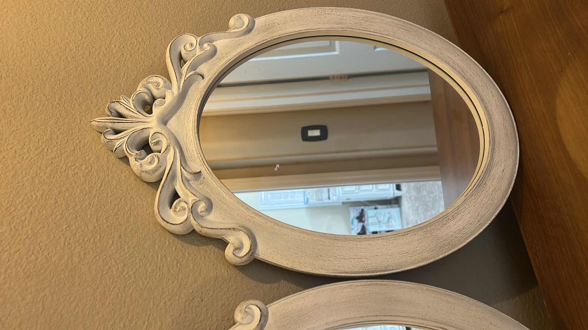 Photo 1 of 2 OVAL FRAMED MIRRORS 16” x H23”AND FAUX FLORAL