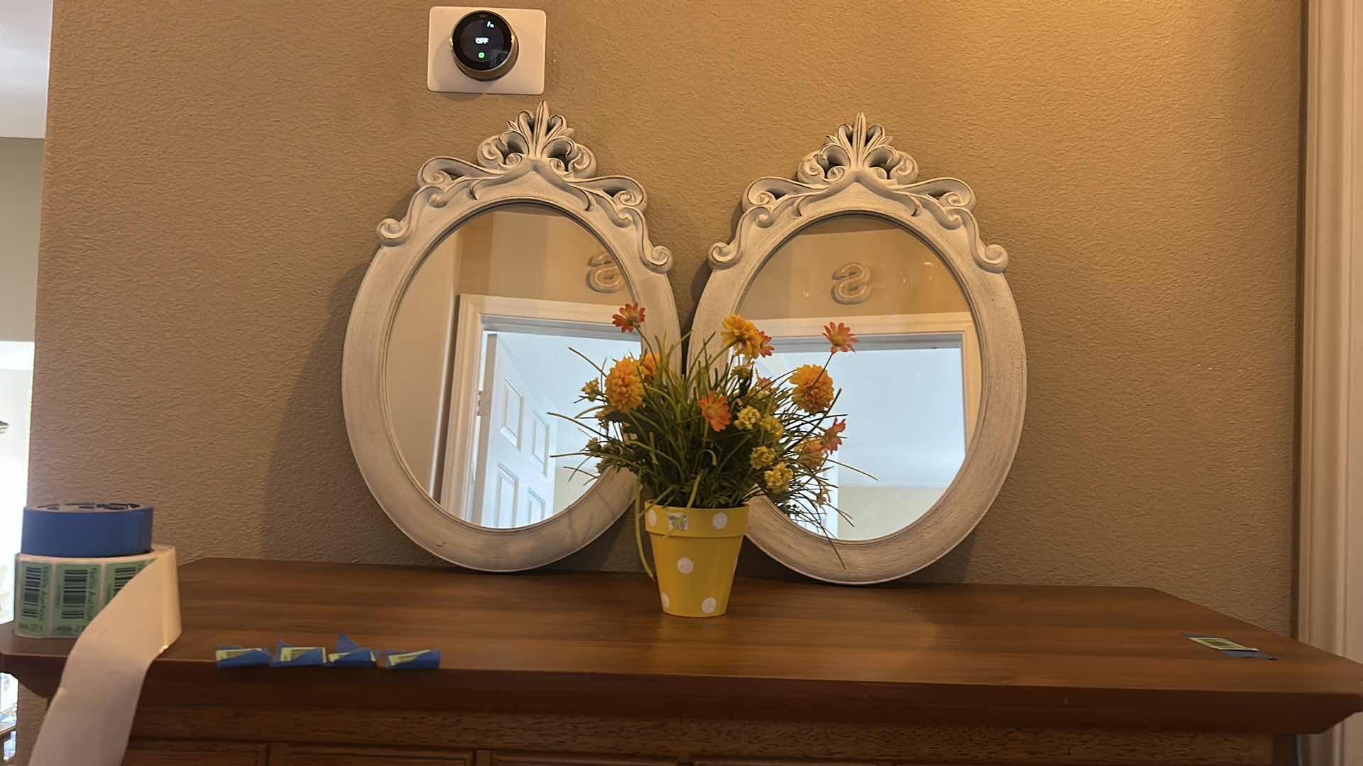 Photo 1 of 2 OVAL FRAMED MIRRORS 16” x H23”AND FAUX FLORAL