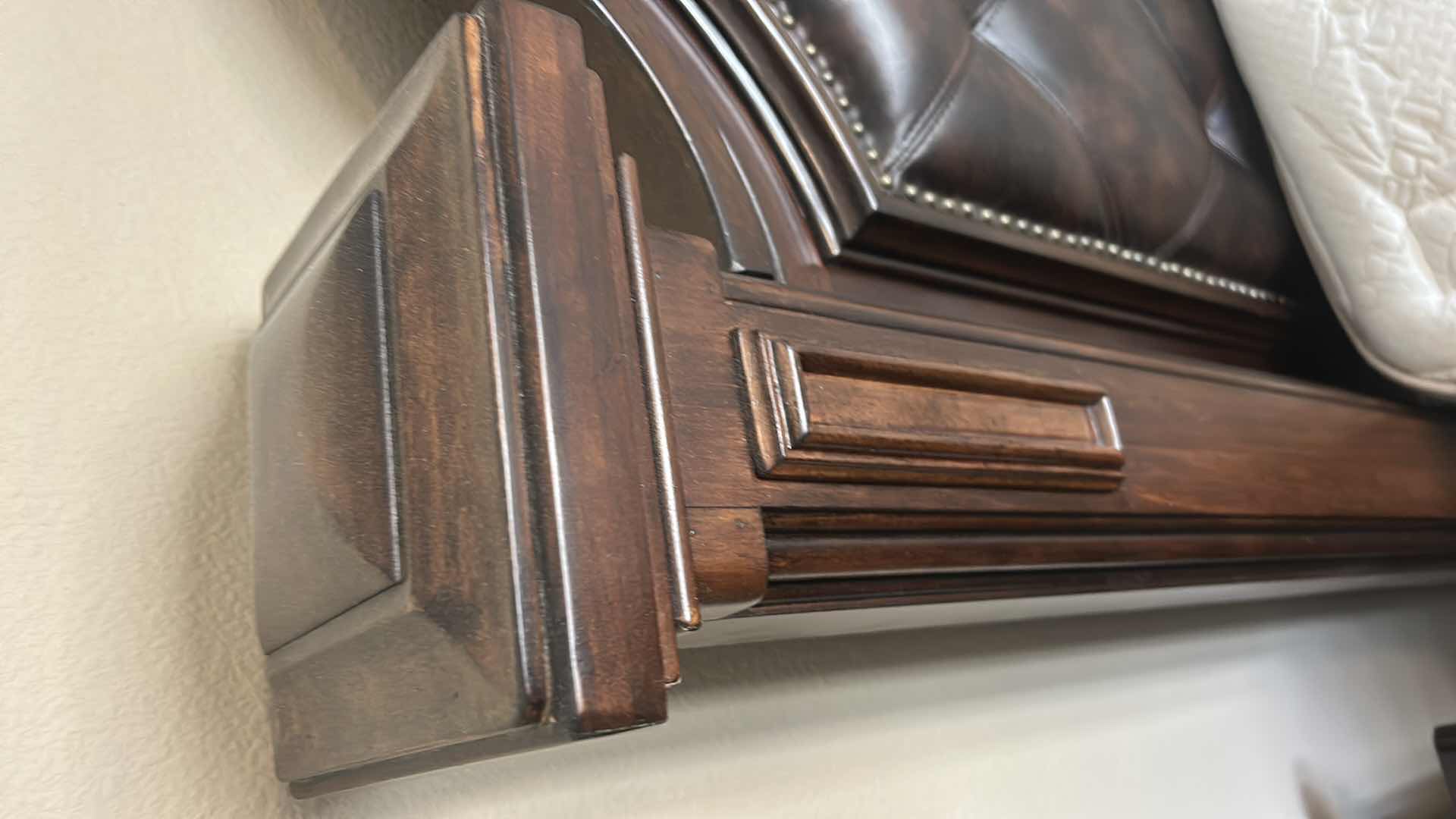 Photo 1 of HOMELEGANCE ADELINA COLLECTION PANEL BED, FEATURING A CHERRY FINISH, FAUX LEATHER UPHOLSTERED HEADBOARD WITH BUTTON TUFTING, AND INTRICATE WOOD CARVINGS. 7‘ x 8‘ x H6‘ $2200