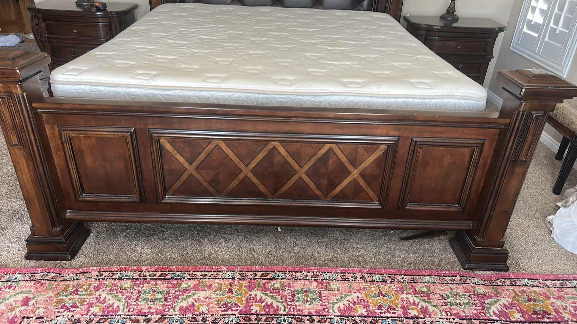 Photo 1 of HOMELEGANCE ADELINA COLLECTION PANEL BED, FEATURING A CHERRY FINISH, FAUX LEATHER UPHOLSTERED HEADBOARD WITH BUTTON TUFTING, AND INTRICATE WOOD CARVINGS. 7‘ x 8‘ x H6‘ $2200
