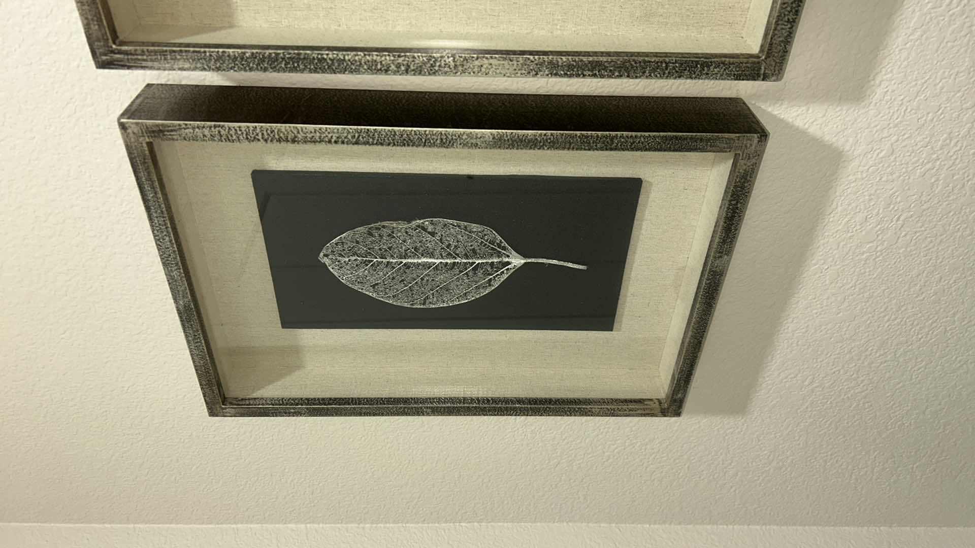 Photo 1 of GILDED LEAVES SHADOW BOXES SET OF 4 - PRESERVED LEAVES FINISHED IN ELEGANT GOLD AND SILVER LEAF, MOUNTED ON A BLACK LINEN BACKING, WITH AN OATMEAL LINEN INTERIOR LINER. SHADOW BOXES ARE FRAMED IN A HEAVILY BURNISHED SILVER LEAF.
DIMENSIONS: 12 W X 17 H X