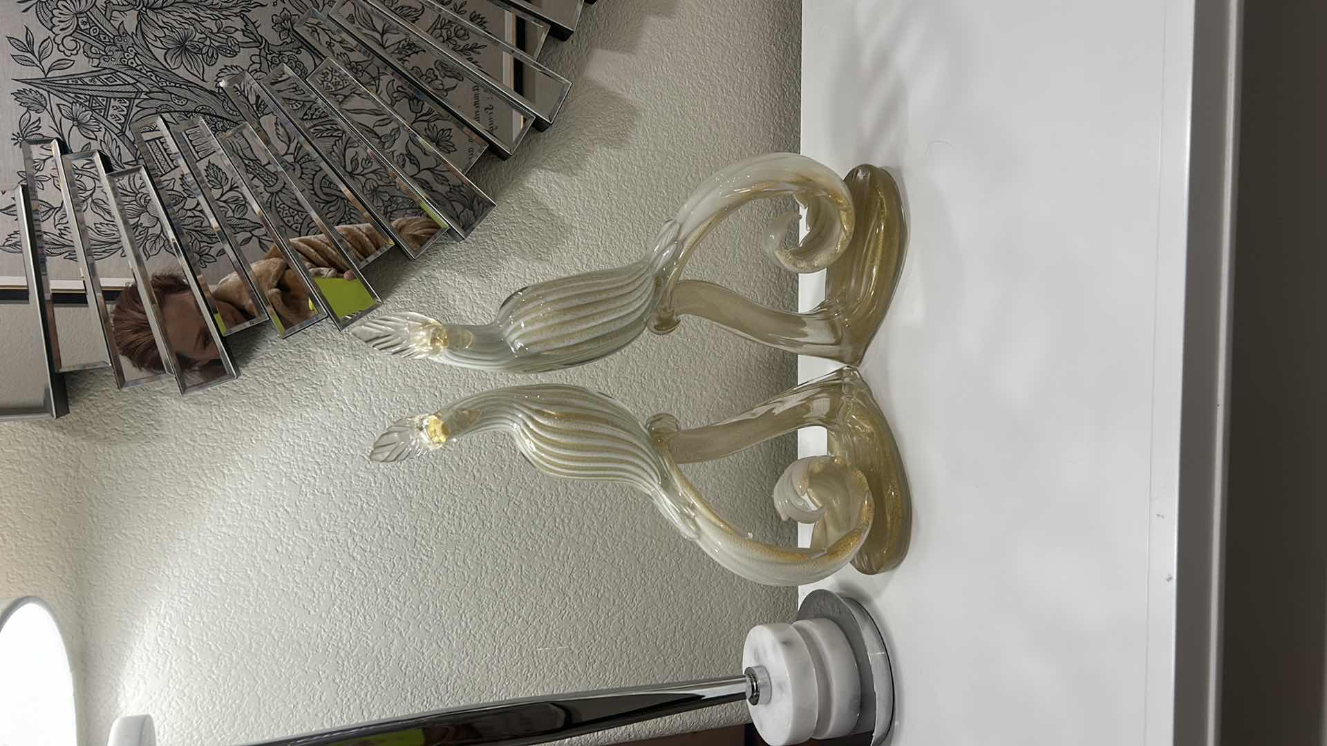 Photo 1 of PAIR OF MID-CENTURY MURANO HANDBLOWN GLASS BIRDS, ATTRIBUTED TO ALFREDO BARBINI.
• DESIGN: WHITE LATTIMO GLASS WITH 24 KT GOLD LEAF INCLUSIONS THROUGHOUT.
• MAKER: ATTRIBUTED TO RENOWNED MURANO GLASS ARTIST ALFREDO BARBINI.
• DIMENSIONS: APPROXIMATELY H1