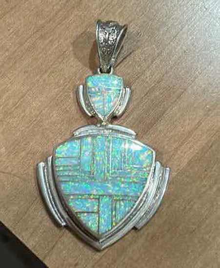Photo 1 of HANDMADE “SUPER SMITHS” NATIVE AMERICAM STERLING SILVER OPAL INLAY SHIELD FORM PENDANT 3”
MARKED STERLING WITH BEAR PAW HALLMARK AND LETTER C