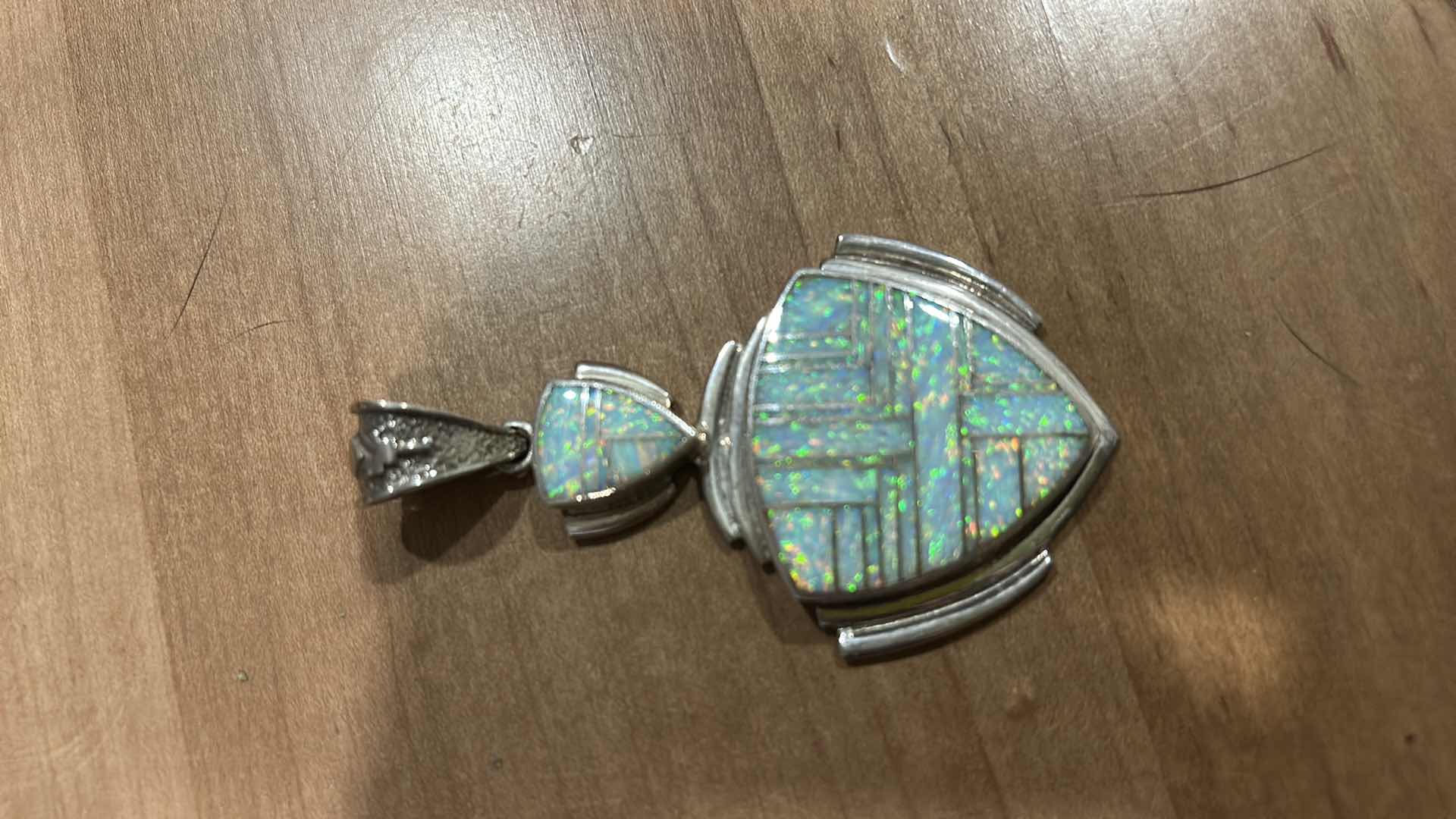 Photo 1 of HANDMADE “SUPER SMITHS” NATIVE AMERICAM STERLING SILVER OPAL INLAY SHIELD FORM PENDANT 3”
MARKED STERLING WITH BEAR PAW HALLMARK AND LETTER C