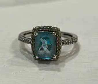 Photo 1 of STERLING SILVER BLUE TOPAZ HALO RING WITH CZ EST SIZE 8