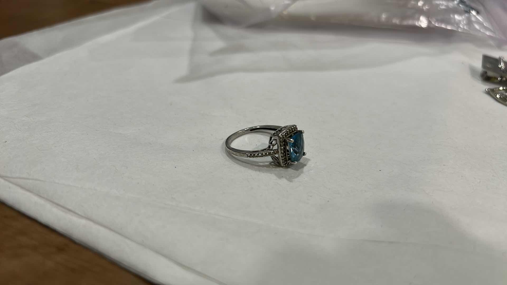 Photo 1 of STERLING SILVER BLUE TOPAZ HALO RING WITH CZ EST SIZE 8