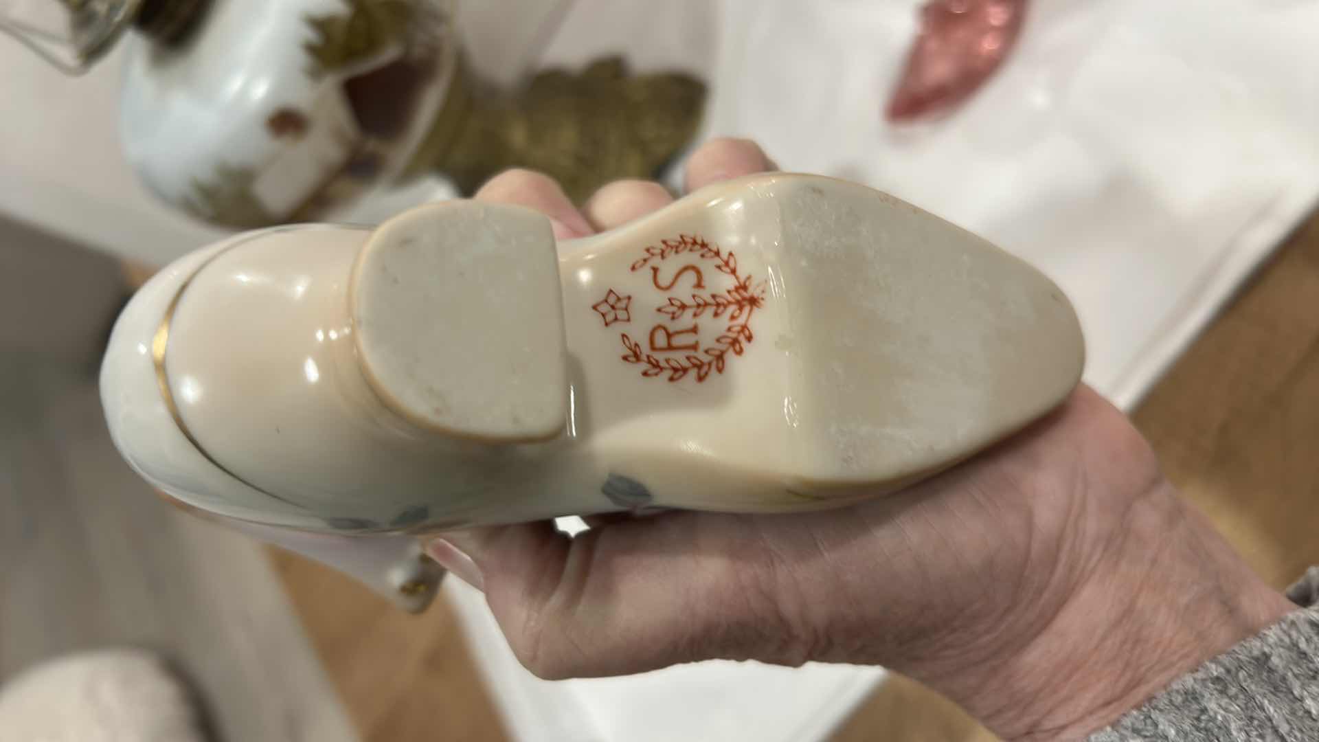Photo 1 of VINTAGE DECOR- HAND PAINTED HURRICANE LAMP (EAGLE) R&S HAND PAINTED PORCELAIN SHOE, HAND PAINTED KELVIN FINE CHINA SHOE, 7528 MC COY PITCHER AND BOWL &
MORE