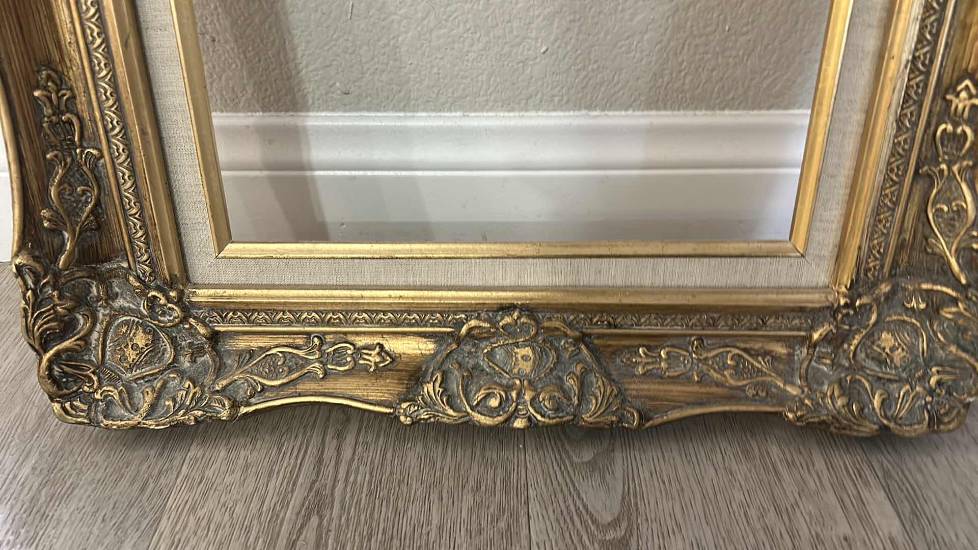 Photo 1 of ANTIQUE ORNATE WOOD GOLD PICTURE FRAME, FEATURING BAROQUE OR ROCOCO STYLE CARVINGS. 19” x H22 1/2”