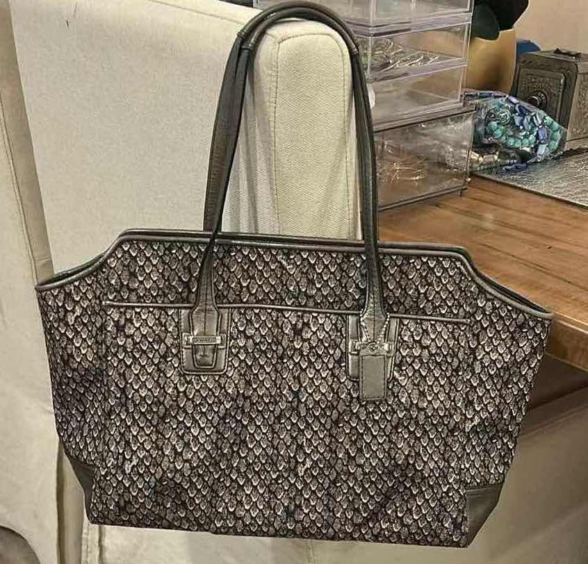 Photo 1 of COACH TAYLOR ALEXIS SNAKE PRINT CARRYALL SATCHEL HANDBAG (STYLE #F26034)
STATEMENT SATCHEL FEATURING A BOLD SNAKE PRINT FABRIC EXTERIOR WITH METALLIC LEATHER TRIM AND SILVER-TONE HARDWARE.