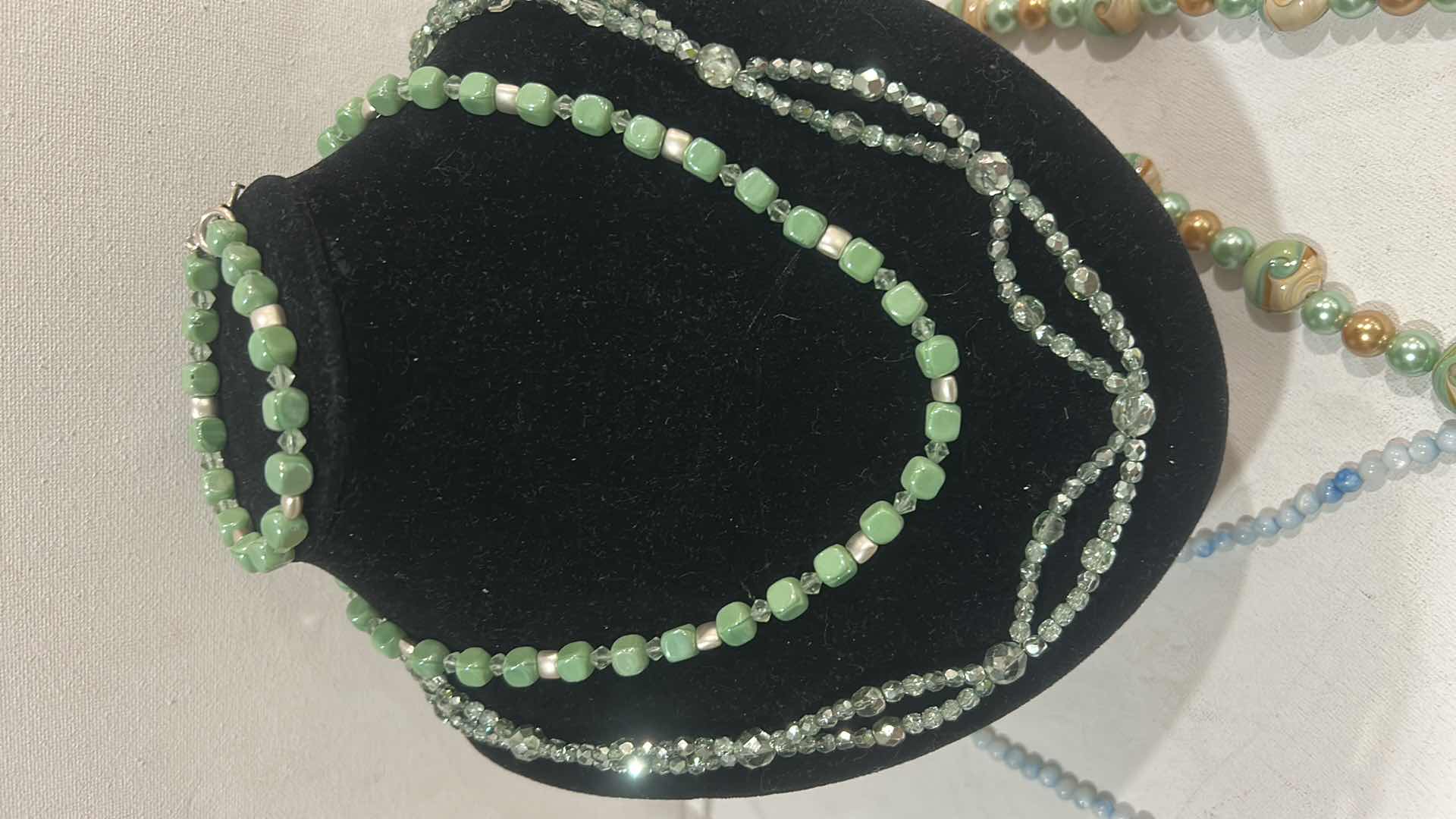 Photo 1 of FASHION JEWELRY- 4 NECKLACES AND 1 BRACELET