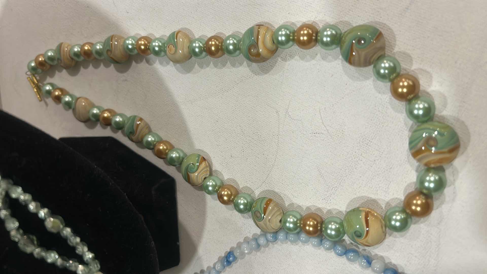 Photo 1 of FASHION JEWELRY- 4 NECKLACES AND 1 BRACELET