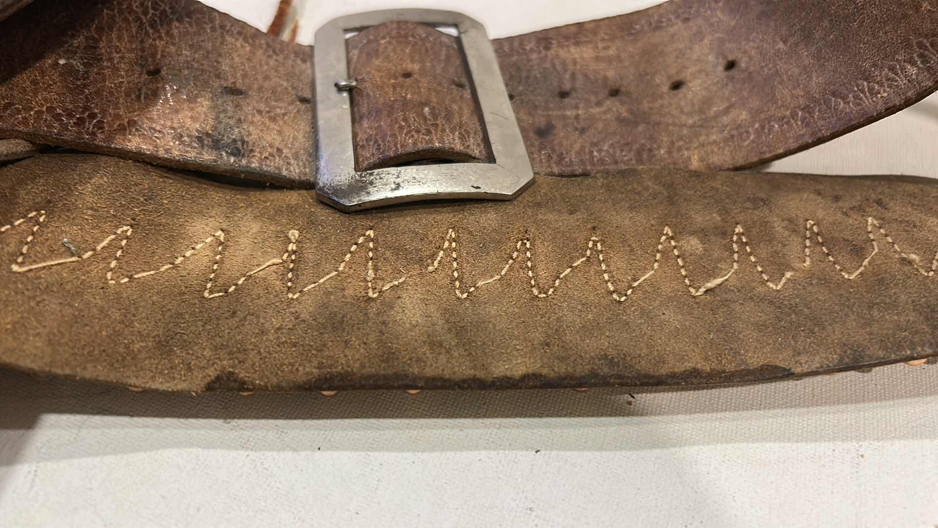 Photo 1 of ANTIQUE LEATHER BELT AND HOLSTER WITH FEDERAL 38 SPECIAL BULLETS