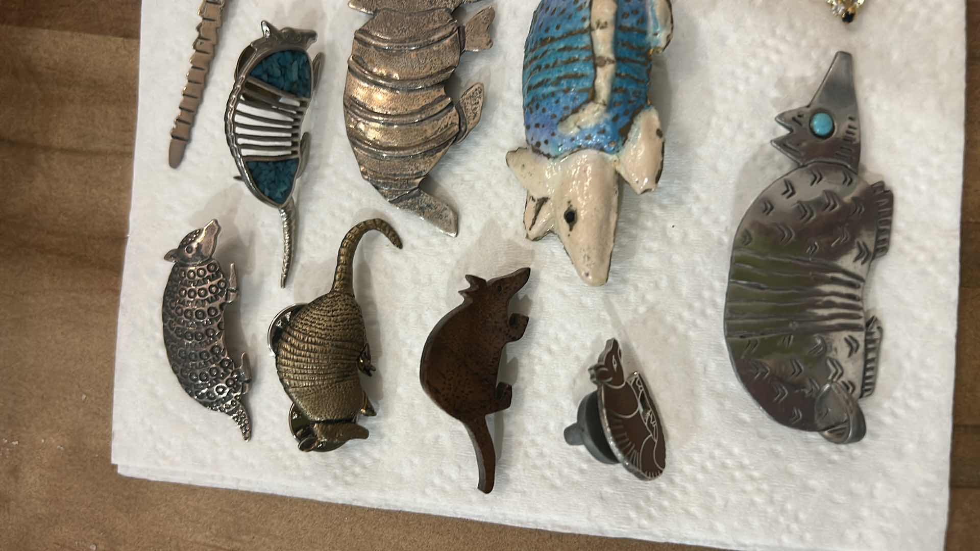 Photo 1 of FASHION JEWELRY- 15 ARMADILLO PINS/BROOCHES