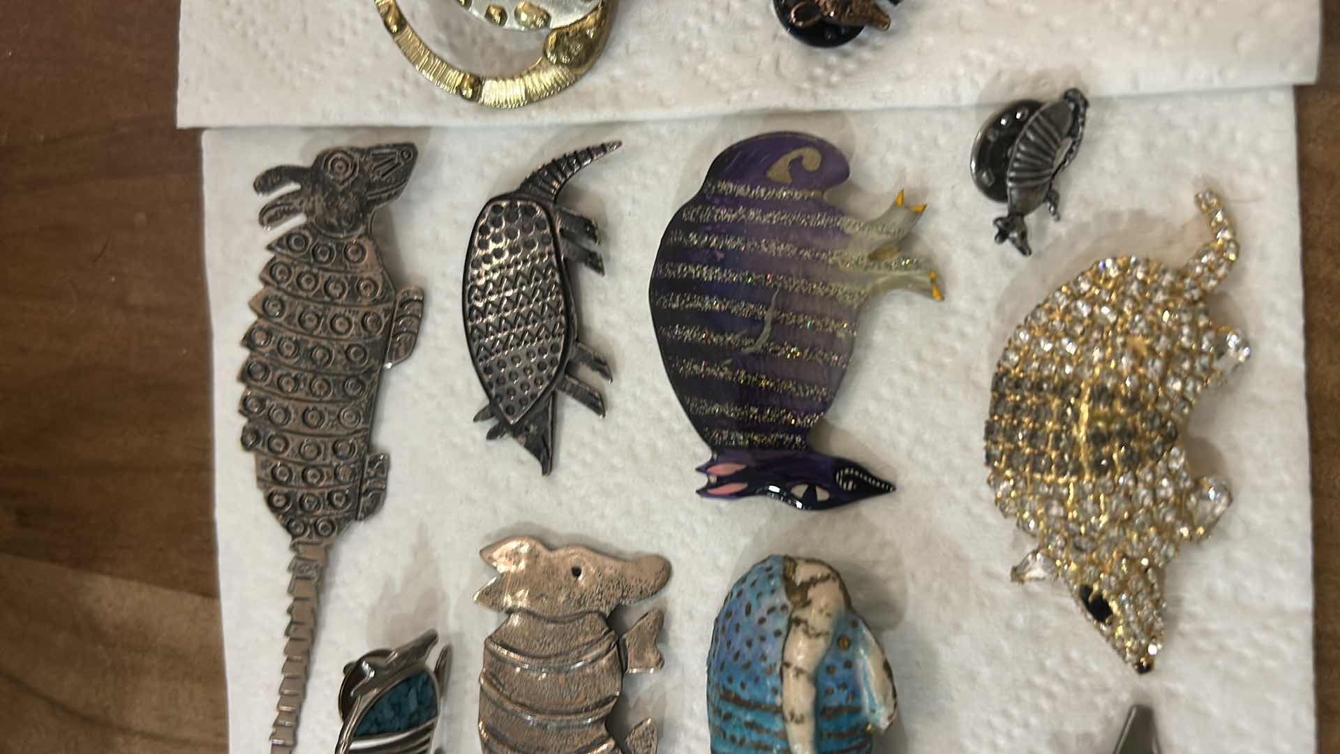 Photo 1 of FASHION JEWELRY- 15 ARMADILLO PINS/BROOCHES