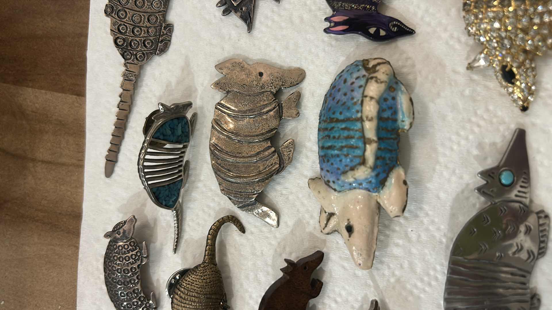 Photo 1 of FASHION JEWELRY- 15 ARMADILLO PINS/BROOCHES