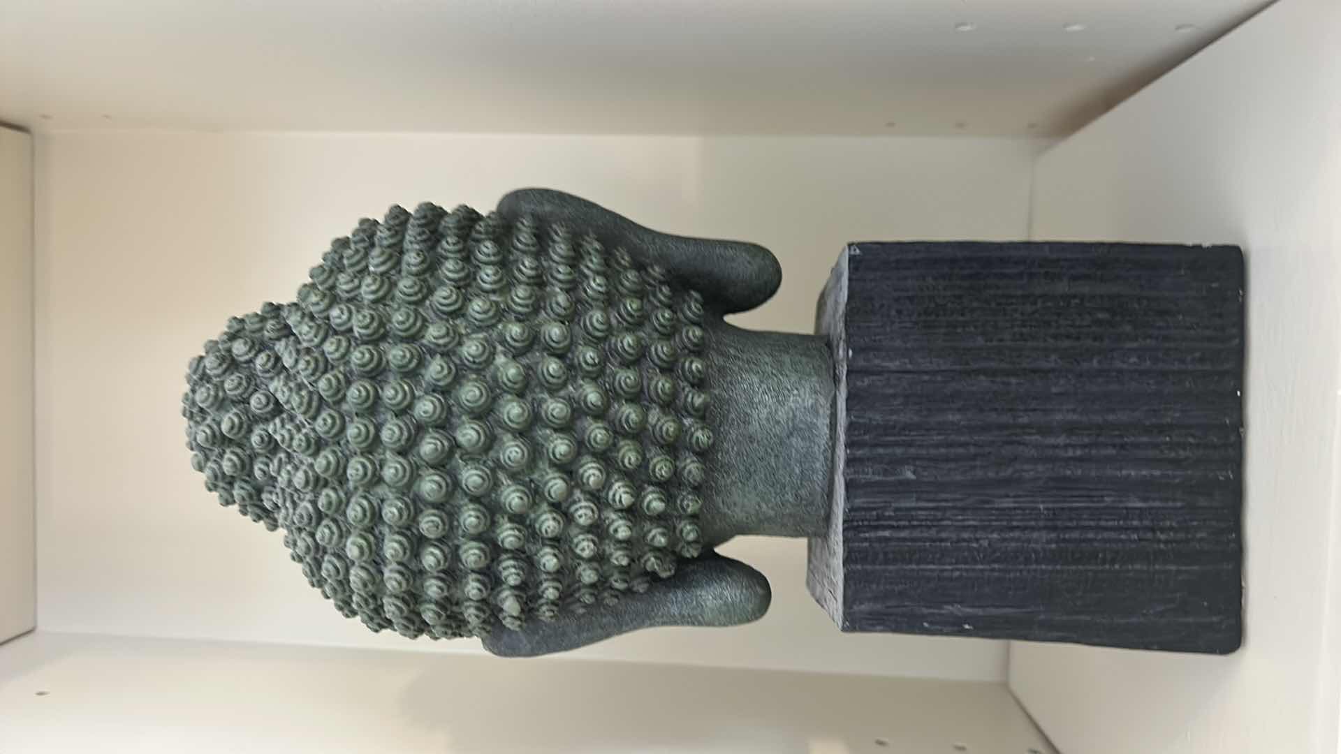 Photo 1 of DECORATIVE BUDDHA BUST FIGURINE MOUNTED ON A PEDESTAL BASE H11”.