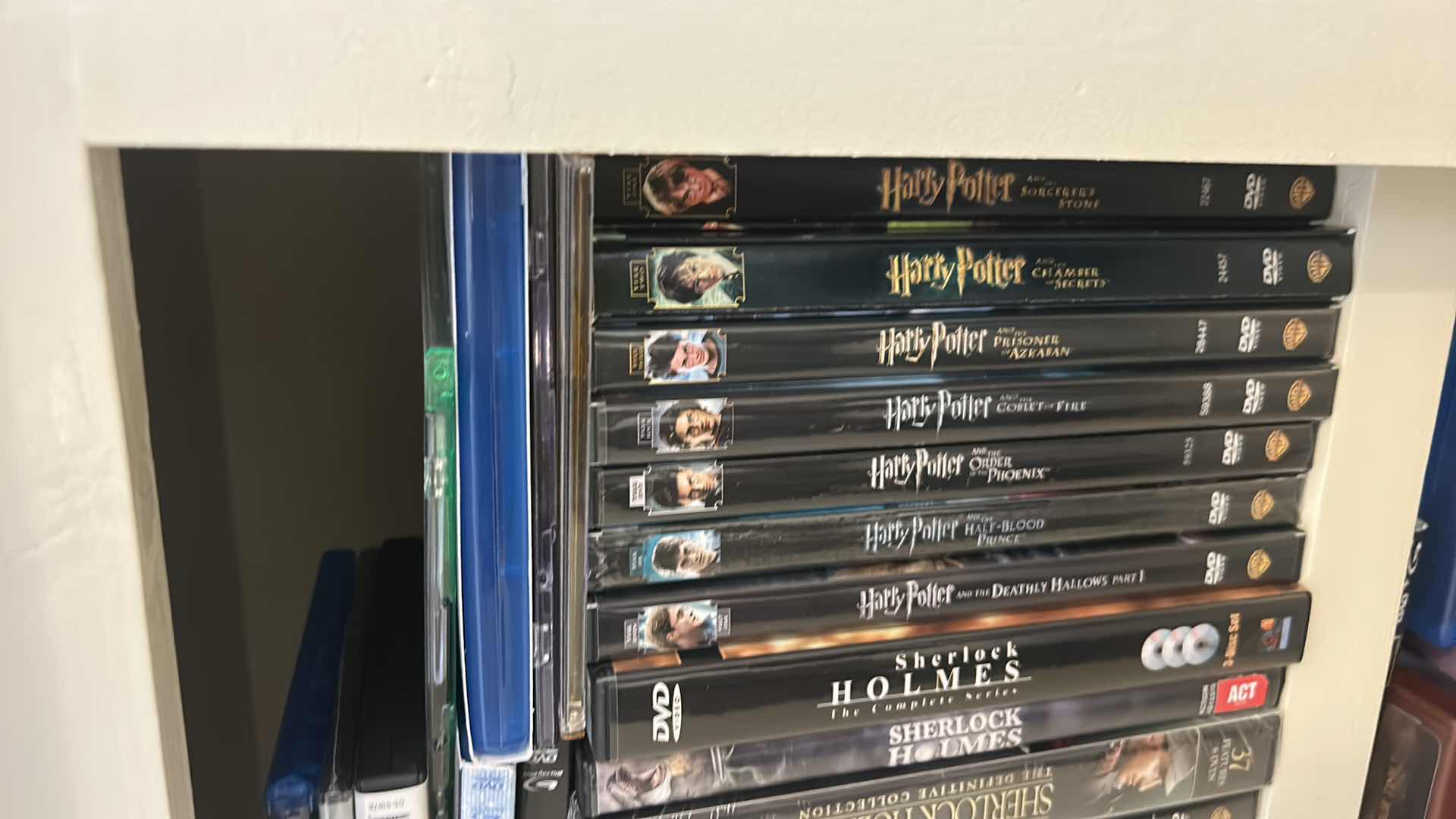 Photo 1 of 2 SHELVES OF DVD’s